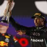 Lewis Hamilton hold his Aaudi Arabian Grand Prix trophy aloft.