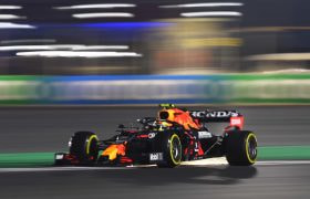 A Red Bull F1 car leaving the pits during the Qatar 2021 race weekend.