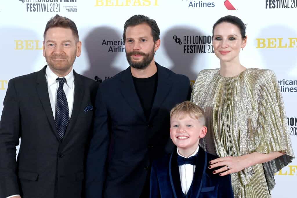 Director Kenneth Branagh and cast members of his film, Belfast.