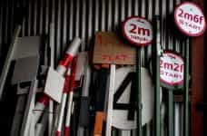 Racecourse signs and signposts in storage.