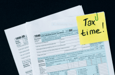 A tax return form and the words tax time.