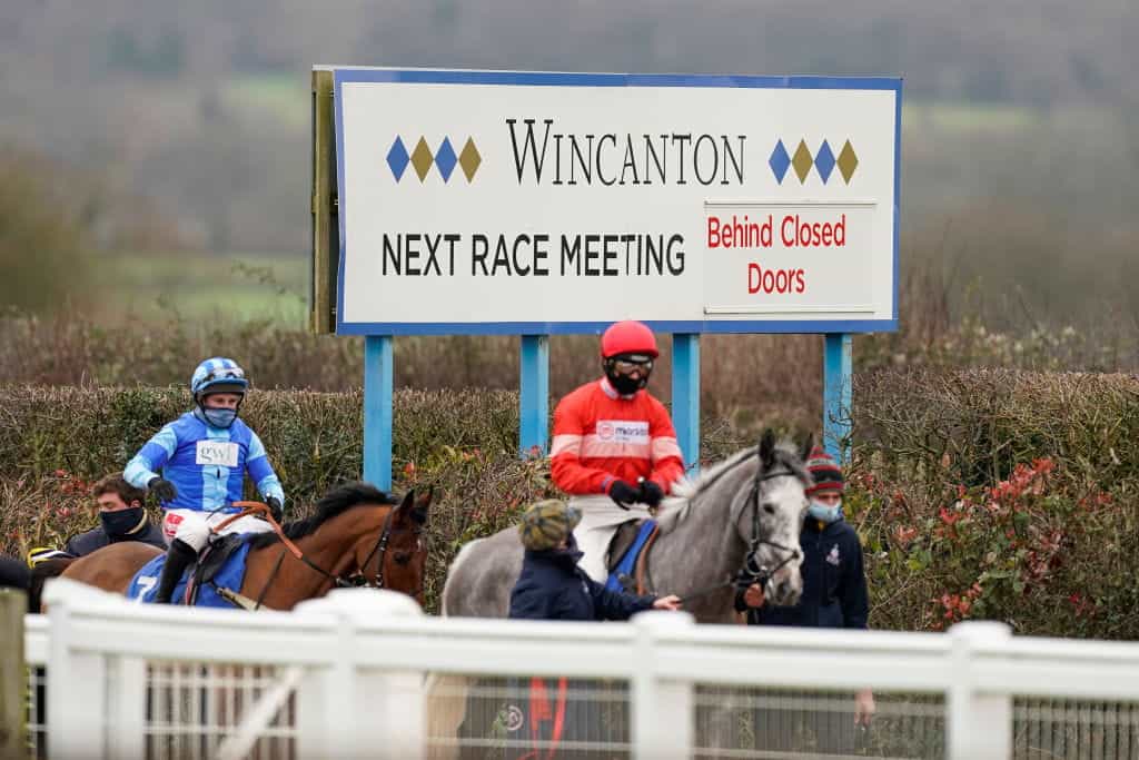 Horses head out onto the Wincanton turf.