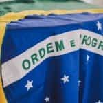 A closeup of the Brazilian flag draped across a table.