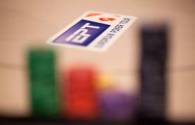 EPT logo embossed on a poker table.