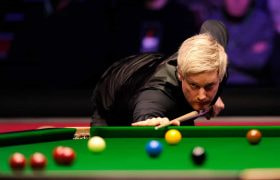 Neil Robertson concentrating on a shot.
