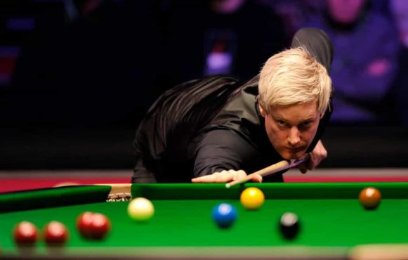 Neil Robertson concentrating on a shot.
