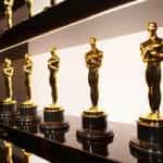 Academy Award Oscar trophies neatly displayed.