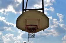 A street basketball hoop and backboard.