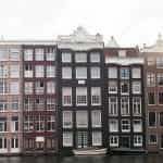 Dutch-style colored houses by a canal