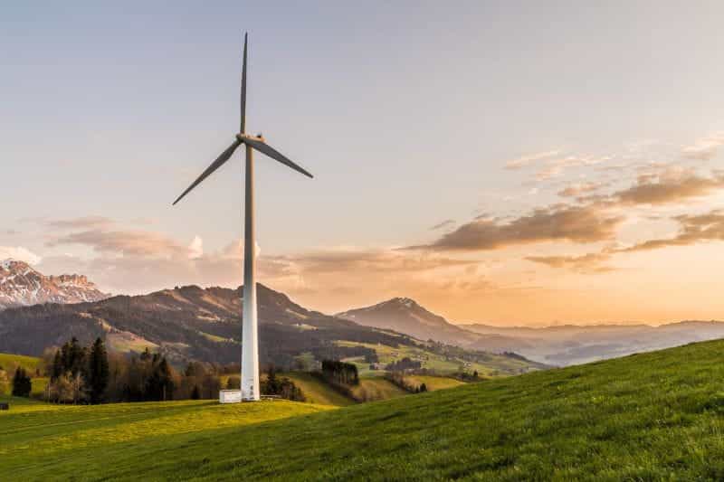 A wind turbine in the mountains.