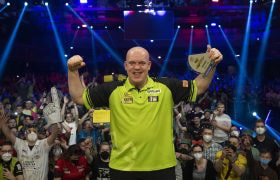 Michael van Gerwen celebrates victory in the German Darts Championship.
