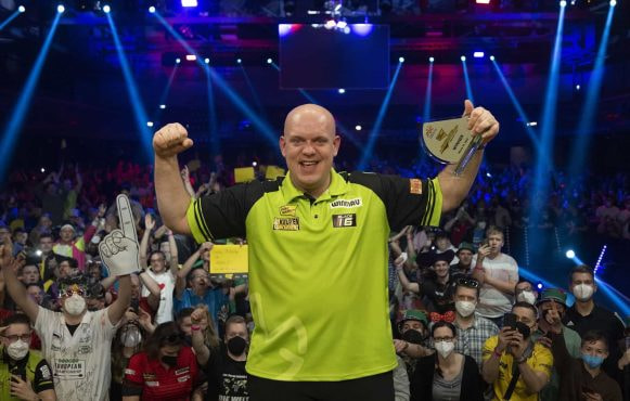 Michael van Gerwen celebrates victory in the German Darts Championship.