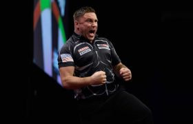 Gerwyn Price celebrates a big check-out at the oche.