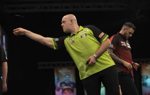 Michael van Gerwen throwing a dart during the 2021 Grand Slam of Darts.