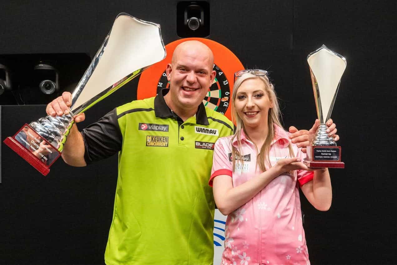 Michael van Gerwen and Fallon Sherrock celebrate a 1-2 finish in a 2021 World Series of Darts tournament.