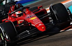 A Ferrari Formula 1 car streaking around the Miami’s street circuit.