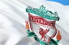 White Liverpool FC flag with the words You'll Never Walk Alone on it.