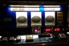 A slots machine with three symbols lined up.