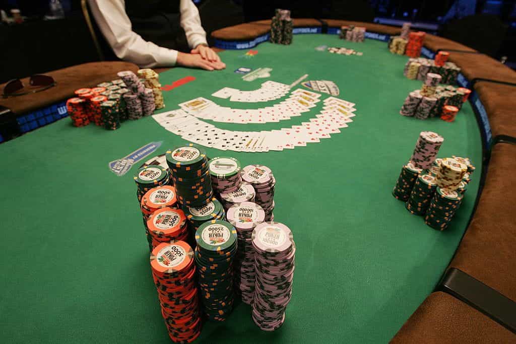 World Series of Poker Chips stacked high on a poker table.