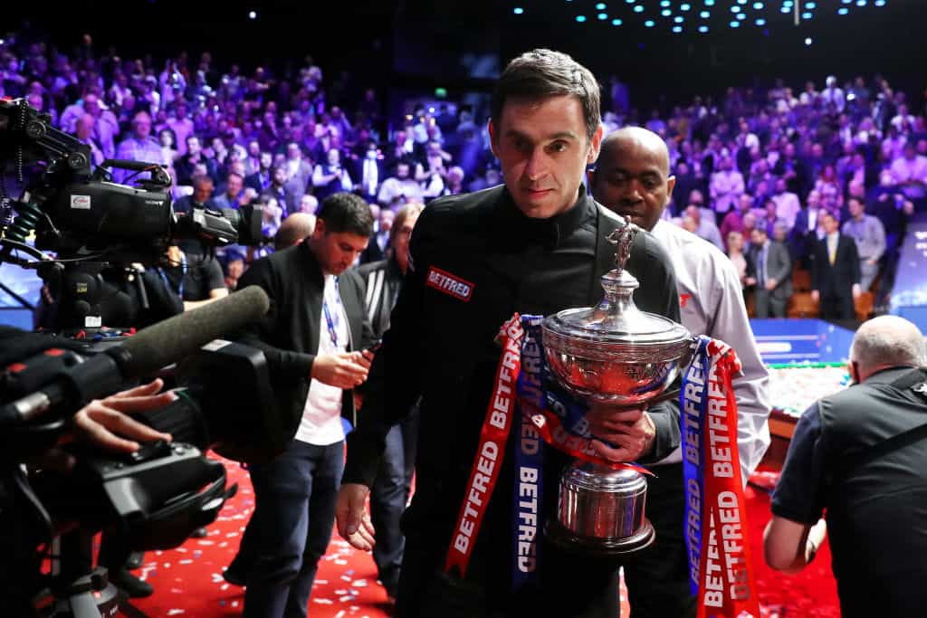 Ronnie O’Sullivan leaves the World Championship stage with his trophy in hand. 