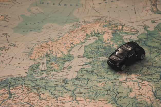 A map of northern Europe featuring Sweden with a model car.