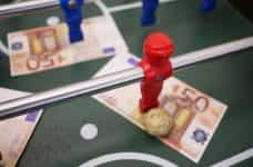 Table football and cash.