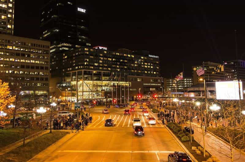 A major street in downtown Baltimore, Maryland at night.