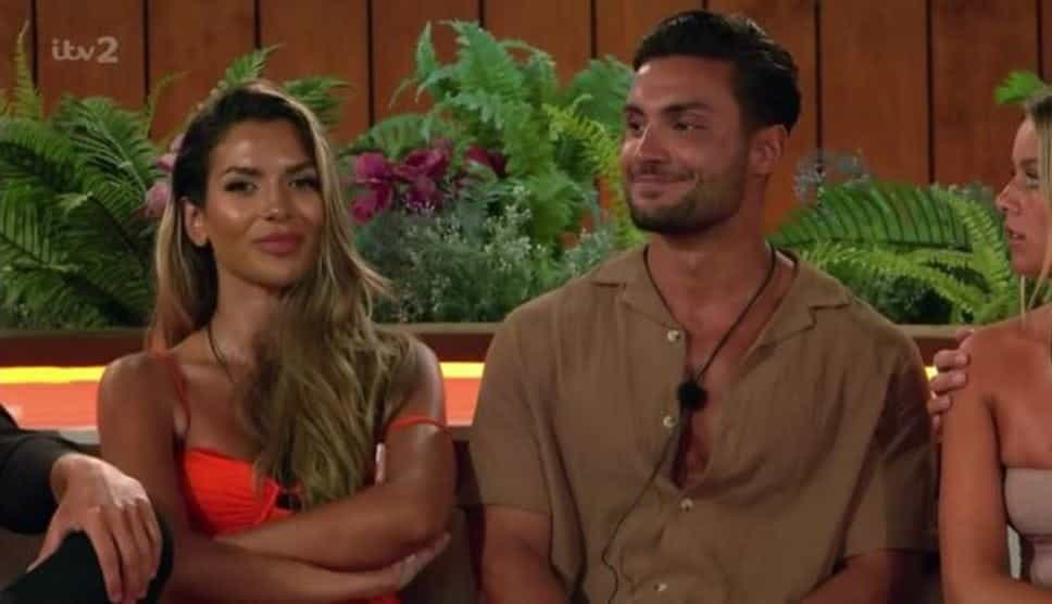 Davide and Ekin-Su appearing relaxed during a scene from Love Island 2022.