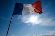 The French flag fluttering.