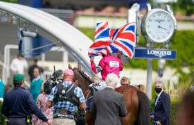 Nicola Currie celebrates after riding a winner at the 2021 Dubai Duty Free Shergar Cup. 