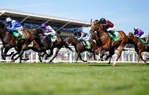 Jim Crowley riding Minzaal to victory at Newbury.