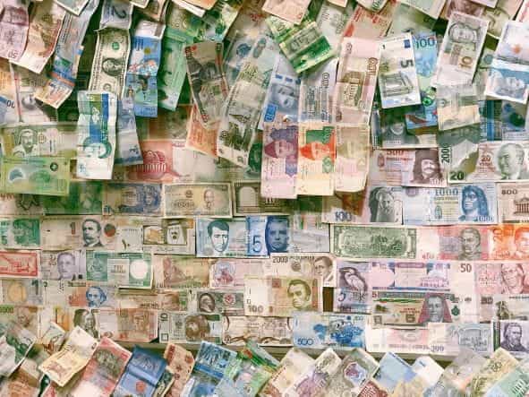 A collection of currency notes from around the world.