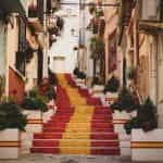 Steps in Spain are painted with the colors of the Spanish flag, red and gold.