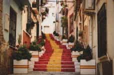 Steps in Spain are painted with the colors of the Spanish flag, red and gold.