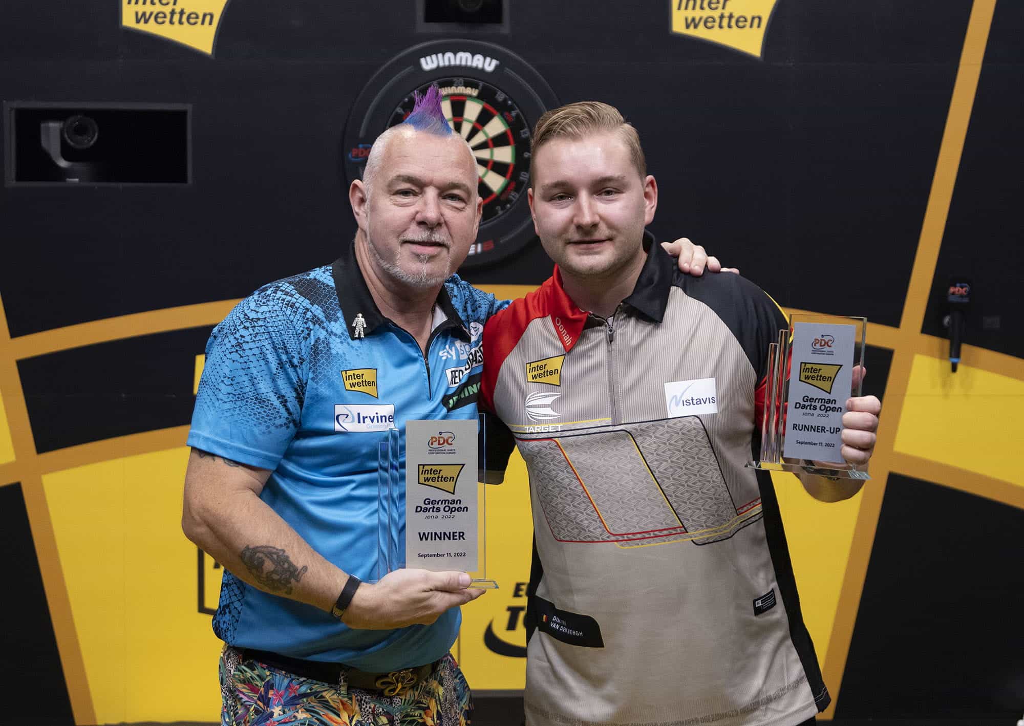 Peter Wright and Dimitri Van den Bergh.