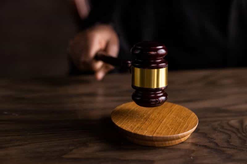 A judge using a gavel.