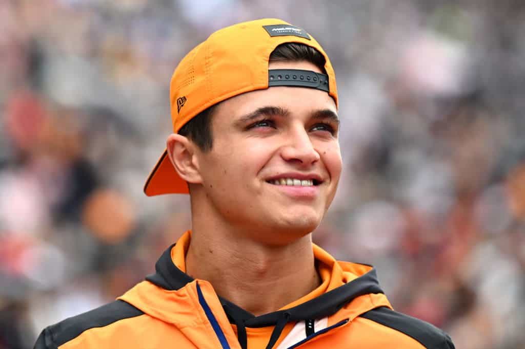 Lando Norris acknowledges fans during the drivers’ parade at the Japanese Grand Prix.