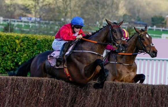 Rachael Blackmore, riding A Plus Tard, clear the last to win The Boodles Cheltenham Gold Cup.