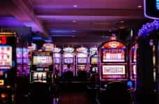 Rows of slot machines in a gaming room.