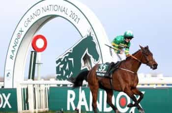 Rachael Blackmore and Minella Times cross the line ahead in the 2021 Grand National.