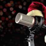 A Santa hat sitting on a microphone.