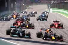 Cars race to the opening corner at the 2021 Brazilian Grand Prix.