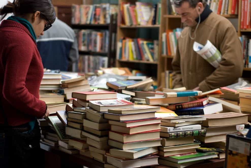 People browsing in a book shop.