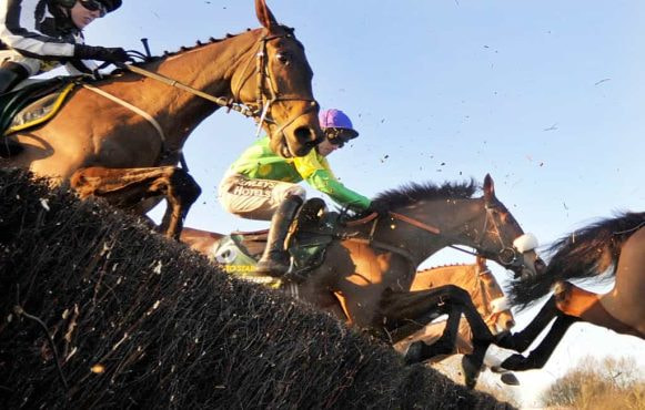 Kauto Star about to win the King George VI Chase at Kempton Park in 2008.