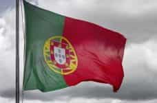 The Portugal flag attached to a flag pole.