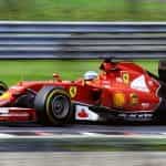 Ferrari driving in Formula One race.