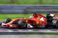 Ferrari driving in Formula One race.