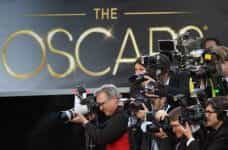 Photographers cover the red-carpet arrivals to the 85th Annual Academy Awards.