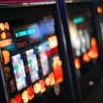 A bright and blurred slot machine front.