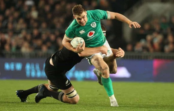 Garry Ringrose of Ireland is tackled by Brodie Retallick of the All Blacks during in an International test match at Eden Park